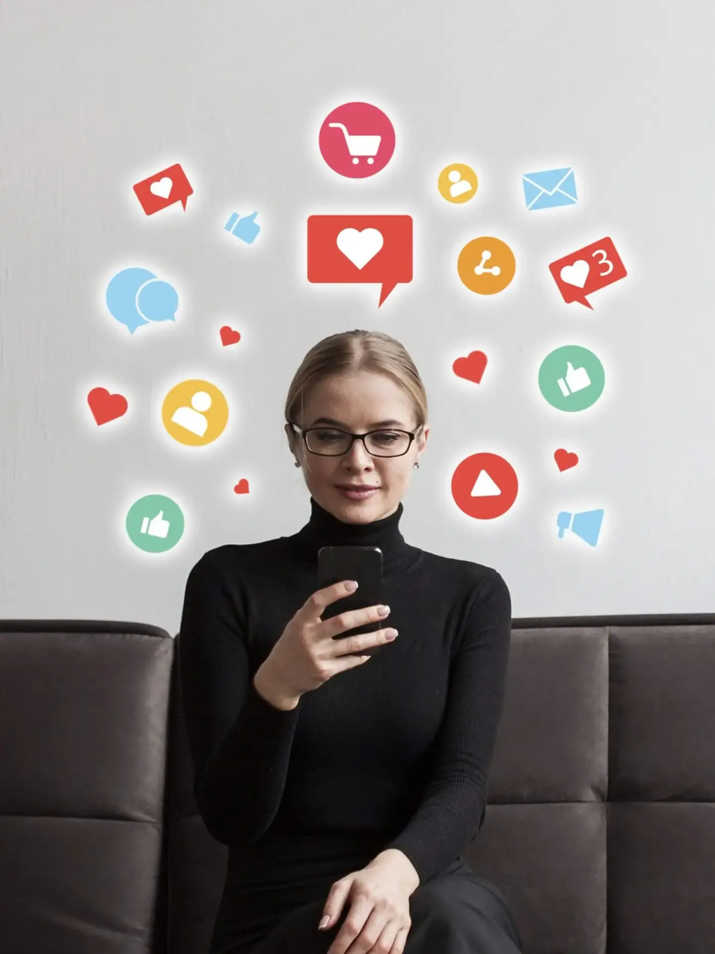 Professional woman using smartphone with various social media icons floating around her, representing Bnternet's expertise in social media marketing